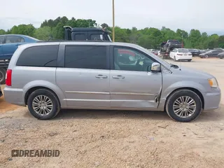 2014 Chrysler Town & Country Touring L with VIN 2C4RC1CG9ER376058, listed as a IAAI auction lot 42099348 with 186,226 mi miles and . Bid and sale history available at DreamBid. Image 13.