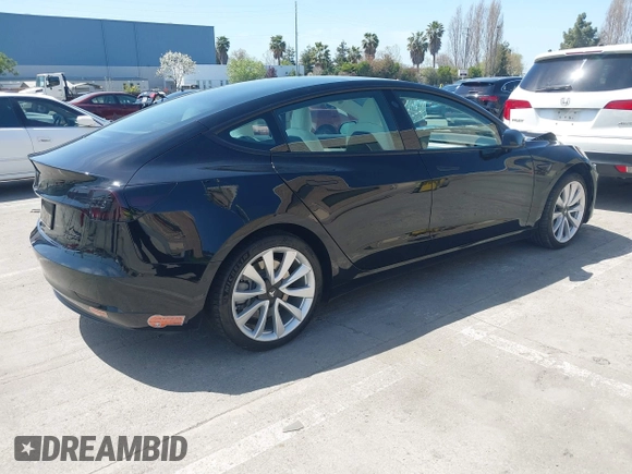2019 Tesla Model 3 Long Range with VIN 5YJ3E1EB6KF192477, listed as a IAAI auction lot 41981600 with 62,888 mi miles. Bid and sale history available at carsss.com. Image 4.
