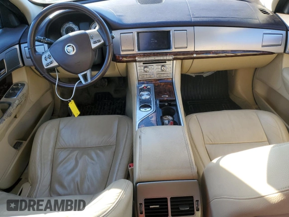 2011 Jaguar XF with VIN SAJWA0FB9BLS12379, listed as a Copart auction lot 41519534 with 135,848 mi miles and Salvage Title. Bid and sale history available at carsss.com. Image 8.