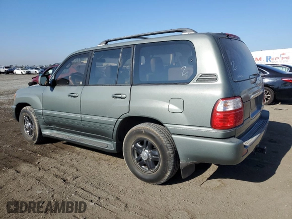 2002 Lexus LX 470 z VIN JTJHT00W723519186, wystawiony jako Copart lot #70190464 z przebiegiem 306 793 mil mil oraz Tytuł czysty. Historia ofert i sprzedaży dostępna na DreamBid. Obrazek 2.