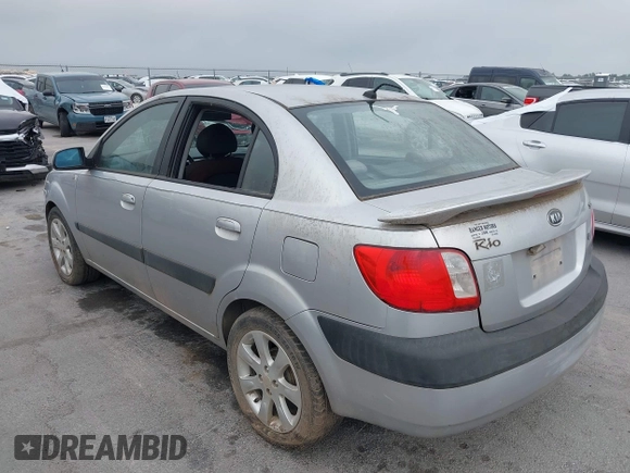2007 Kia Rio LX with VIN KNADE123476286326, listed as a IAAI auction lot 42106275 with 183,042 mi miles. Bid and sale history available at carsss.com. Image 3.