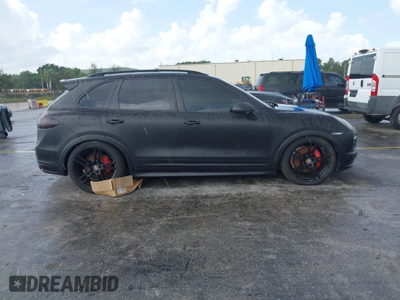 2014 Porsche Cayenne GTS with VIN WP1AD2A28ELA74131, listed as a IAAI auction lot 42829362 with Not provided miles and . Bid and sale history available at DreamBid. Image 13.