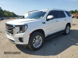 2021 GMC Yukon SLT with VIN 1GKS1BKT0MR425247, listed as a Copart auction lot 69205584 with 72,952 mi miles and Salvage Title. Bid and sale history available at carsss.com. Image 1.