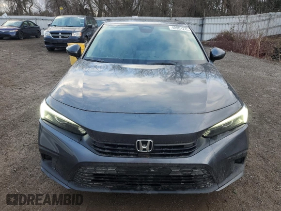 2022 Honda Civic LX z VIN 2HGFE2F21NH103335, wystawiony jako Copart lot #48901245 z przebiegiem 87 844 mil mil oraz Czysty tytuł • Clean title. Historia ofert i sprzedaży dostępna na DreamBid. Obrazek 5.