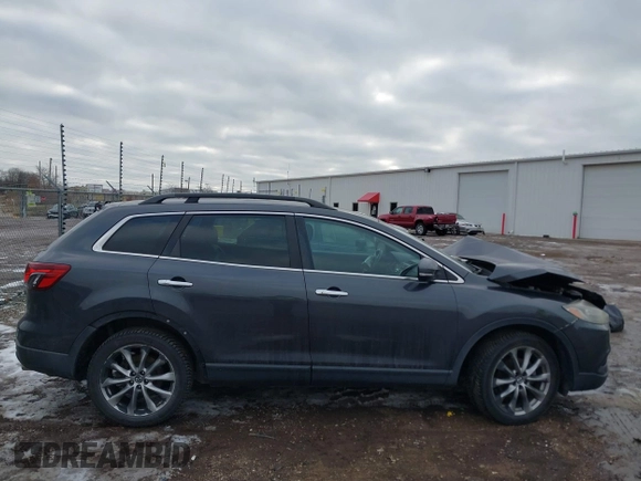 2015 Mazda CX-9 Grand Touring with VIN JM3TB2DAXF0447537, listed as a IAAI auction lot 41191694 with 157,113 mi miles. Bid and sale history available at carsss.com. Image 13.
