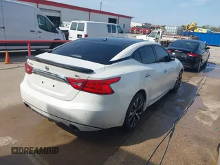 2016 Nissan Maxima SL with VIN 1N4AA6AP5GC383075, listed as a IAAI auction lot 41415505 with 164,392 mi miles and . Bid and sale history available at DreamBid. Image 4.
