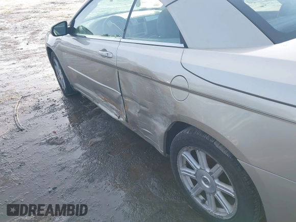 2008 Chrysler Sebring Touring z VIN 1C3LC55R68N669319, wystawiony jako IAAI lot #41655516 z przebiegiem 150 913 mil mil oraz . Historia ofert i sprzedaży dostępna na DreamBid. Obrazek 6.