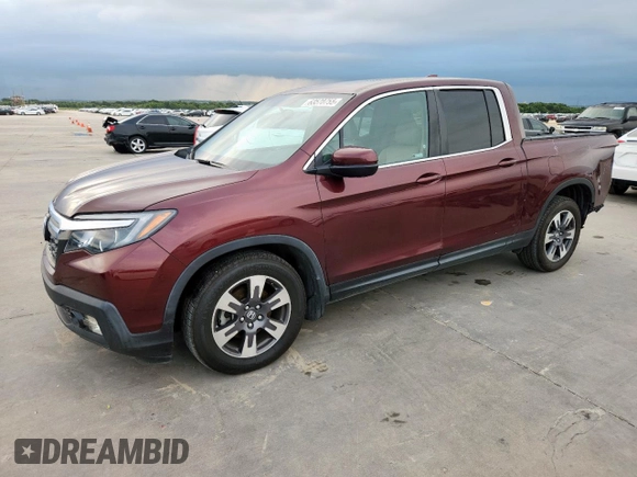 2019 Honda Ridgeline RTL-T with VIN 5FPYK2F60KB002573, listed as a Copart auction lot 63570755 with 111,388 mi miles and Salvage title. Bid and sale history available at DreamBid. Image 1.
