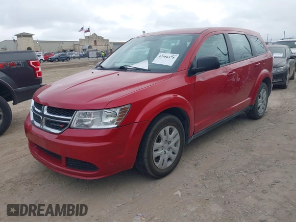 2014 Dodge Journey SE with VIN 3C4PDCAB2ET268532, listed as a IAAI auction lot 42056175 with 126,005 mi miles and . Bid and sale history available at carsss.com. Image 2.