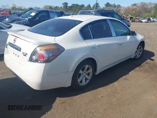 2010 Nissan Altima 3.5 SR with VIN 1N4BL2AP7AN462833, listed as a IAAI auction lot 42125463 with 142,180 mi miles. Bid and sale history available at carsss.com. Image 4.