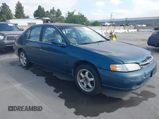 1998 Nissan Altima XE with VIN 1N4DL01D2WC254087, listed as a IAAI auction lot 42184722 with 255,372 mi miles and . Bid and sale history available at carsss.com. Image 1.