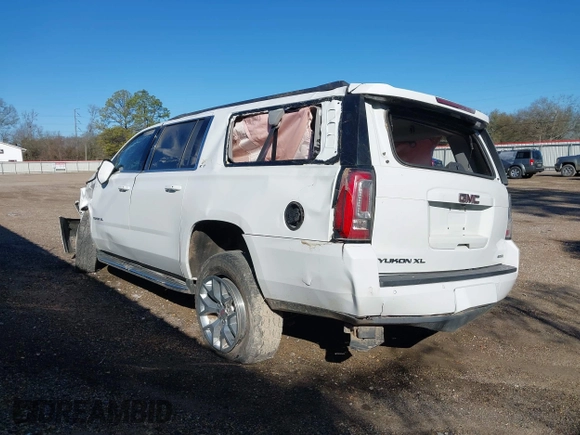 2019 GMC Yukon XL SLT with VIN 1GKS1GKC1KR335082, listed as a IAAI auction lot 41652504 with 135,824 mi miles. Bid and sale history available at carsss.com. Image 3.