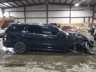 2023 Dodge Durango SRT Hellcat Premium z VIN 1C4SDJH90PC596225, wystawiony jako IAAI lot #41600943 z przebiegiem 18 877 mil mil oraz . Historia ofert i sprzedaży dostępna na DreamBid. Obrazek 14.