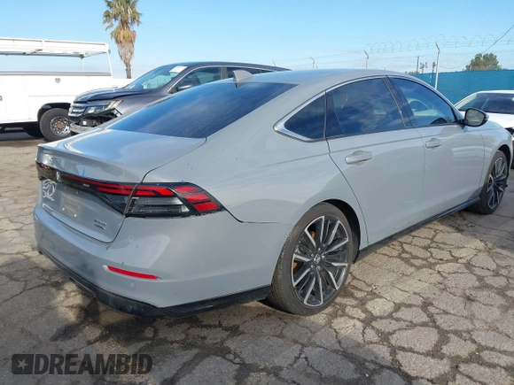 2023 Honda Accord Touring with VIN 1HGCY2F81PA035053, listed as a IAAI auction lot 41807628 with 57,422 mi miles and . Bid and sale history available at DreamBid. Image 4.