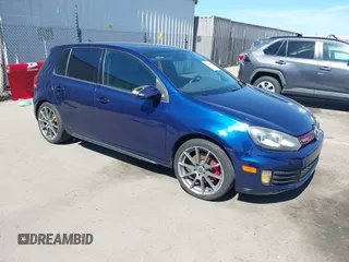 2011 Volkswagen GTI w/Sunroof & Navi PZEV z VIN WVWGD7AJ9BW104487, wystawiony jako IAAI lot #41702023 z przebiegiem 127 706 mil mil oraz . Historia ofert i sprzedaży dostępna na DreamBid. Obrazek 1.