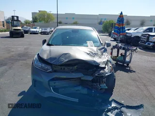 2020 Chevrolet Trax LS with VIN KL7CJKSB3LB353522, listed as a IAAI auction lot 42100884 with Not provided miles and . Bid and sale history available at DreamBid. Image 13.