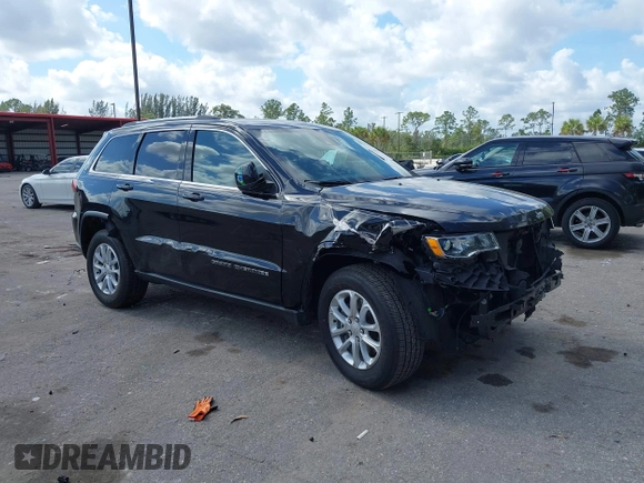 2021 Jeep Grand Cherokee Laredo X with VIN 1C4RJEAG5MC843953, listed as a IAAI auction lot 41558914 with 28,188 mi miles. Bid and sale history available at carsss.com. Image 1.