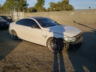 2015 BMW M4 with VIN WBS3R9C53FK332597, listed as a Copart auction lot 72815602 with NaN miles. Bid and sale history available at carsss.com. Image 4.