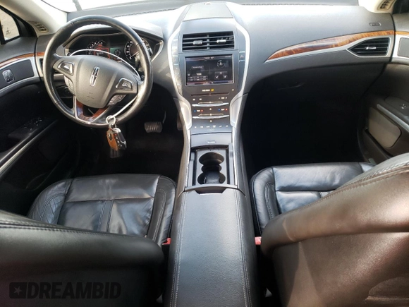 2014 Lincoln MKZ z VIN 3LN6L2GK3ER802789, wystawiony jako Copart lot #86357034 z przebiegiem 215 548 mil mil oraz Szkoda całkowita • Salvage title. Historia ofert i sprzedaży dostępna na DreamBid. Obrazek 8.