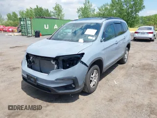 2022 Honda Pilot Special Edition with VIN 5FNYF6H27NB104990, listed as a IAAI auction lot 42219770 with 23,200 mi miles and . Bid and sale history available at DreamBid. Image 2.