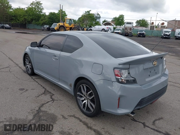2014 Scion tC z VIN JTKJF5C71E3081033, wystawiony jako IAAI lot #42333111 z przebiegiem 144 124 mil mil oraz . Historia ofert i sprzedaży dostępna na DreamBid. Obrazek 3.