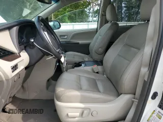 2016 Toyota Sienna XLE with VIN 5TDYK3DC3GS730639, listed as a Copart auction lot 57379935 with 105,323 mi miles and Salvage title. Bid and sale history available at DreamBid. Image 7.