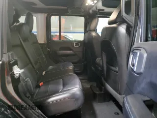 2021 Jeep Wrangler Unlimited Sahara High Altitude with VIN 1C4HJXEG9MW571844, listed as a Copart auction lot 81482334 with 77,409 mi miles and Salvage title. Bid and sale history available at DreamBid. Image 11.