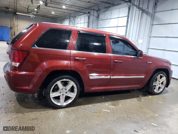 2007 Jeep Grand Cherokee SRT-8 with VIN 1J8HR78357C509051, listed as a Copart auction lot 79013524 with 161,580 mi miles and Salvage Title. Bid and sale history available at carsss.com. Image 3.