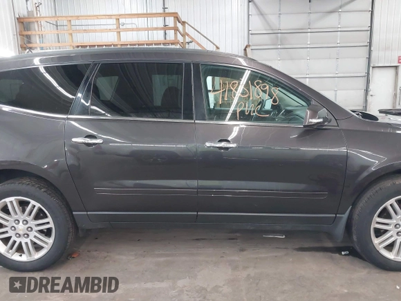 2015 Chevrolet Traverse LT with VIN 1GNKVGKD1FJ220650, listed as a IAAI auction lot 41801898 with 112,878 mi miles and . Bid and sale history available at DreamBid. Image 14.
