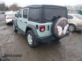 2023 Jeep Wrangler Sport S with VIN 1C4HJXDN5PW609316, listed as a IAAI auction lot 40960863 with 15,614 mi miles and . Bid and sale history available at DreamBid. Image 3.