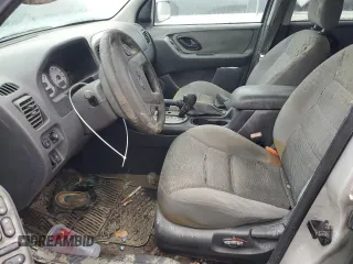 2005 Ford Escape XLT with VIN 1FMYU03135DA00081, listed as a Copart auction lot 74485414 with 0 mi miles and Salvage Title. Bid and sale history available at carsss.com. Image 7.