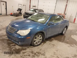 2010 Chrysler Sebring Limited z VIN 1C3BC6EV4AN122733, wystawiony jako IAAI lot #41420349 z przebiegiem 128 164 mil mil oraz . Historia ofert i sprzedaży dostępna na DreamBid. Obrazek 2.