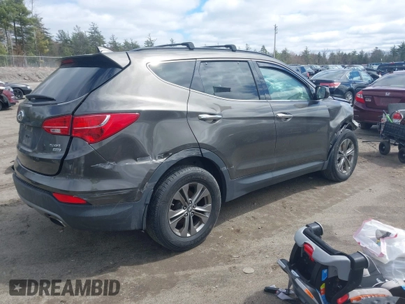 2014 Hyundai Santa Fe with VIN 5XYZUDLB6EG213889, listed as a IAAI auction lot 42036202 with 188,247 mi miles and . Bid and sale history available at DreamBid. Image 4.