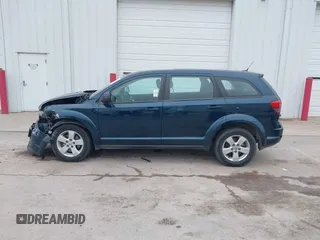 2013 Dodge Journey American Value with VIN 3C4PDCAB8DT602979, listed as a IAAI auction lot 42318493 with 179,210 mi miles and . Bid and sale history available at DreamBid. Image 14.