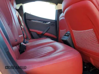 2017 Maserati Ghibli S Q4 z VIN ZAM57RTA6H1247079, wystawiony jako Copart lot #52099755 z przebiegiem 124 159 mil mil oraz Szkody całkowita. Historia ofert i sprzedaży dostępna na DreamBid. Obrazek 10.