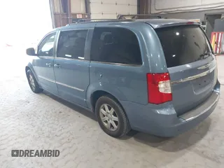 2011 Chrysler Town & Country Touring with VIN 2A4RR5DG4BR779844, listed as a IAAI auction lot 42167693 with 272,502 mi miles and . Bid and sale history available at DreamBid. Image 3.