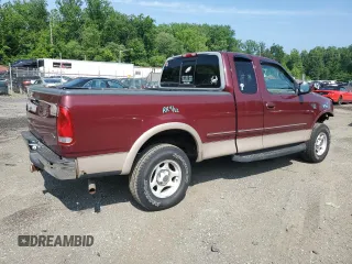 1998 Ford F-150 with VIN 1FTZX18W8WNB76999, listed as a Copart auction lot 59845595 with 135,063 mi miles and Salvage title. Bid and sale history available at DreamBid. Image 3.