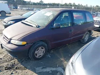 1999 Dodge Caravan with VIN 2B4FP25B8XR249817, listed as a IAAI auction lot 41614211 with 254,135 mi miles and . Bid and sale history available at DreamBid. Image 2.