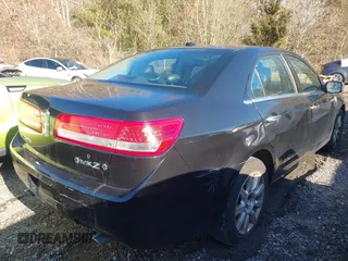 2012 Lincoln MKZ z VIN 3LNHL2GC6CR813803, wystawiony jako IAAI lot #41765231 z przebiegiem 183 292 mil mil oraz . Historia ofert i sprzedaży dostępna na DreamBid. Obrazek 4.