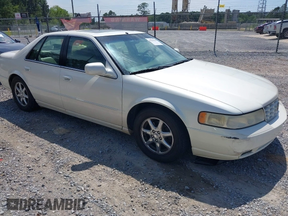 2000 Cadillac Seville Touring STS z VIN 1G6KY5495YU145937, wystawiony jako IAAI lot #42330143 z przebiegiem 217 894 mil mil oraz . Historia ofert i sprzedaży dostępna na DreamBid. Obrazek 1.