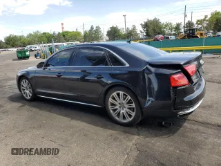 2014 Audi A8 4.0T с VIN WAUR2AFD7EN005348, выставлен на аукционе Copart как лот 58156975 с пробегом 102 754 миль миль и Списание • Salvage title. История ставок и продаж доступна на DreamBid. Изображение 2.