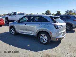 2021 Hyundai NEXO z VIN KM8J74A63MU017007, wystawiony jako Copart lot #73731404 z przebiegiem 11 585 mil mil oraz Czysty tytuł • Clean title. Historia ofert i sprzedaży dostępna na DreamBid. Obrazek 2.