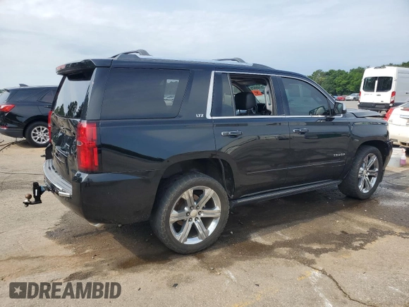 2016 Chevrolet Tahoe LTZ with VIN 1GNSCCKCXGR264655, listed as a Copart auction lot 57456625 with 237,621 mi miles and Salvage title. Bid and sale history available at DreamBid. Image 3.