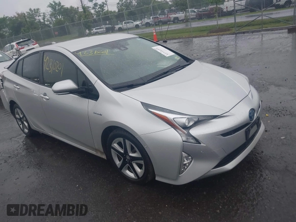 2017 Toyota Prius Two with VIN JTDKARFU4H3043433, listed as a IAAI auction lot 42310201 with 50,715 mi miles and . Bid and sale history available at DreamBid. Image 1.