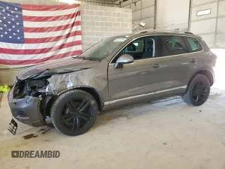 2012 Volkswagen Touareg Sport с VIN WVGEK9BP9CD010811, выставлен на аукционе Copart как лот 48316155 с пробегом 107 802 миль миль и Списание • Salvage title. История ставок и продаж доступна на DreamBid. Изображение 1.