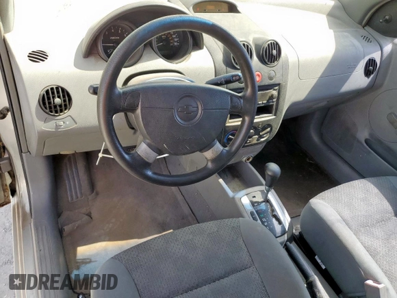 2005 Chevrolet Aveo LS with VIN KL1TD62665B359524, listed as a Copart auction lot 64398555 with 166,819 mi miles and Salvage title. Bid and sale history available at DreamBid. Image 8.