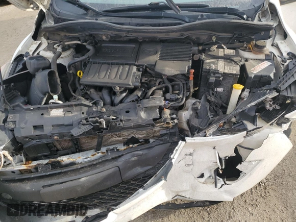 2012 Mazda 2 Sport with VIN JM1DE1KY8C0145089, listed as a Copart auction lot 52093925 with 211,282 mi miles and Salvage Title. Bid and sale history available at DreamBid. Image 11.
