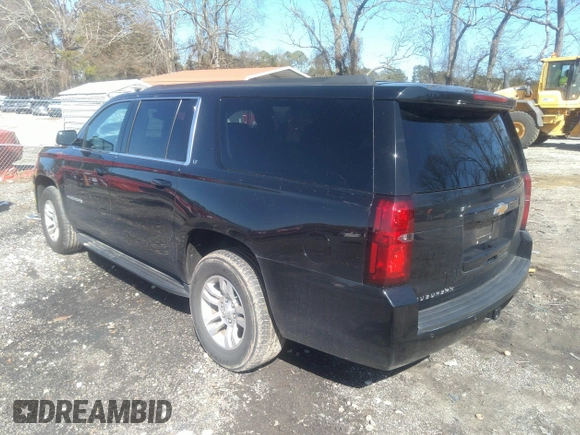 2019 Chevrolet Suburban LT with VIN 1GNSCHKCXKR405939, listed as a IAAI auction lot 41591475 with 106,554 mi miles and . Bid and sale history available at DreamBid. Image 3.