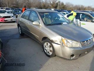 2004 Kia Spectra LX with VIN KNAFE121545043455, listed as a IAAI auction lot 41441356 with 189,566 mi miles. Bid and sale history available at carsss.com. Image 1.