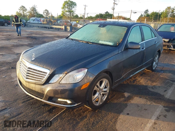2010 Mercedes-Benz E-Class E 350 Luxury with VIN WDDHF5GB4AA260005, listed as a IAAI auction lot 41976779 with 148,324 mi miles. Bid and sale history available at carsss.com. Image 2.